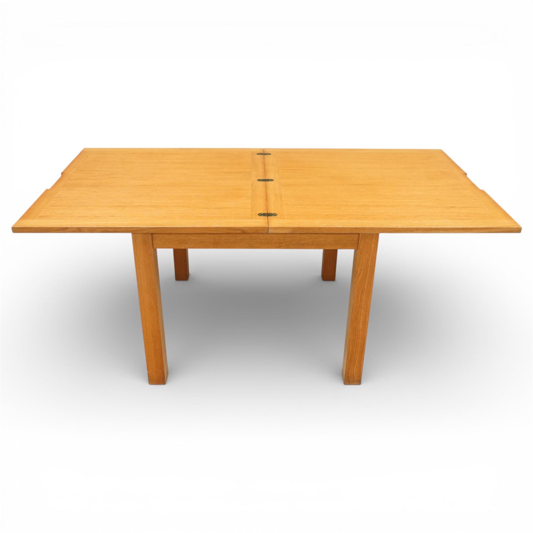 Laura Ashley - extending oak dining table, rectangular top with sliding hinged leaf, raised on square section legs