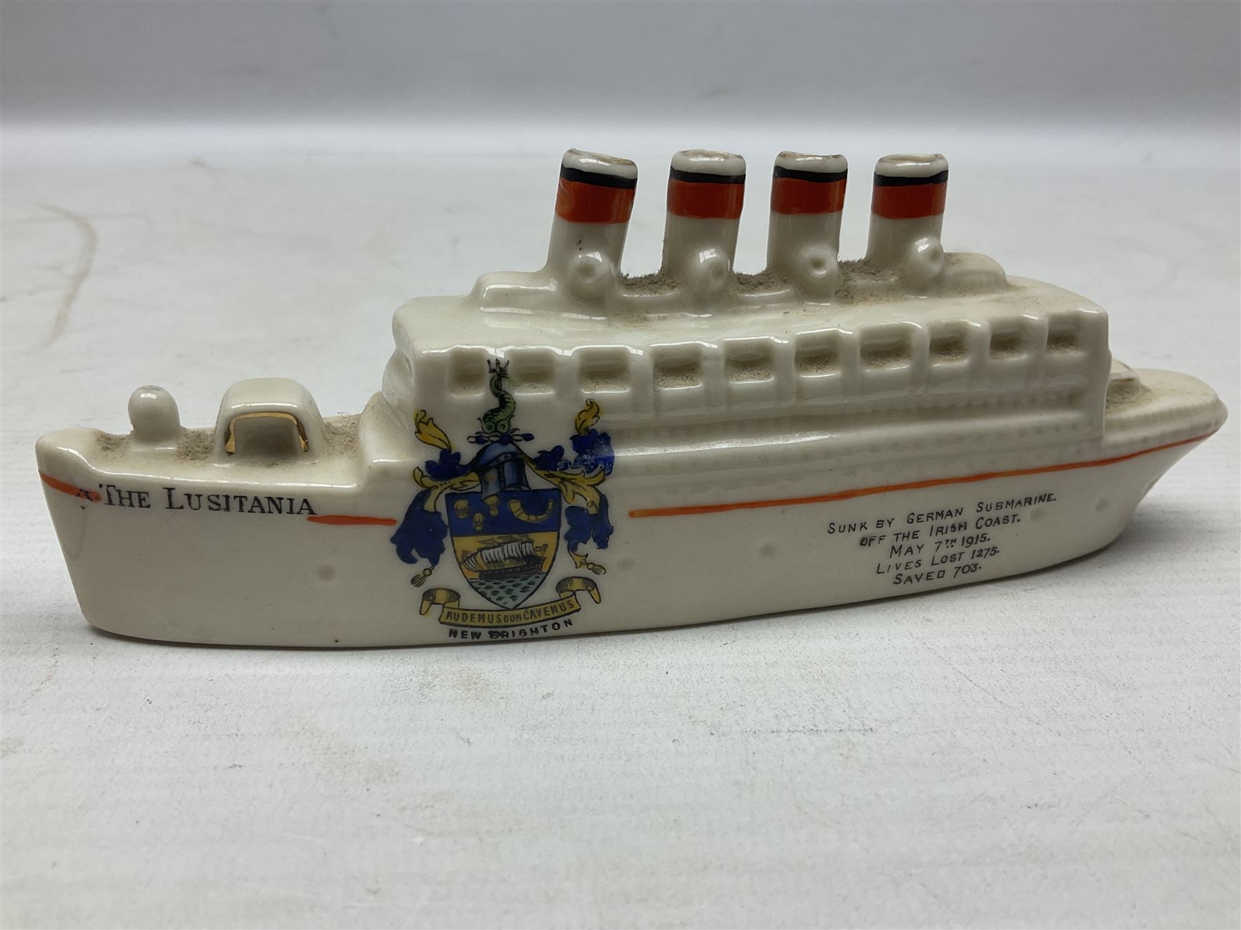 Twelve crested china models of WW1 tanks by Grafton, Arcadian and Carlton china etc with crests from Caistor Lincs, Saffron Walden, Paignton, Evesham etc  , together with a crested china model of the R.M.S Lusitania with New Brighton crest and a two-handled vase for 'The Forts Boxhill' (14)