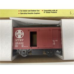 LGB (Lehmann Gross Bahn) G scale, gauge 1 - 0-4-0 tank locomotive No.995001; unboxed; and two American Aristo Craft Trains 2-axle boxcars Santa Fe and Pennsylvania; both boxed (3)