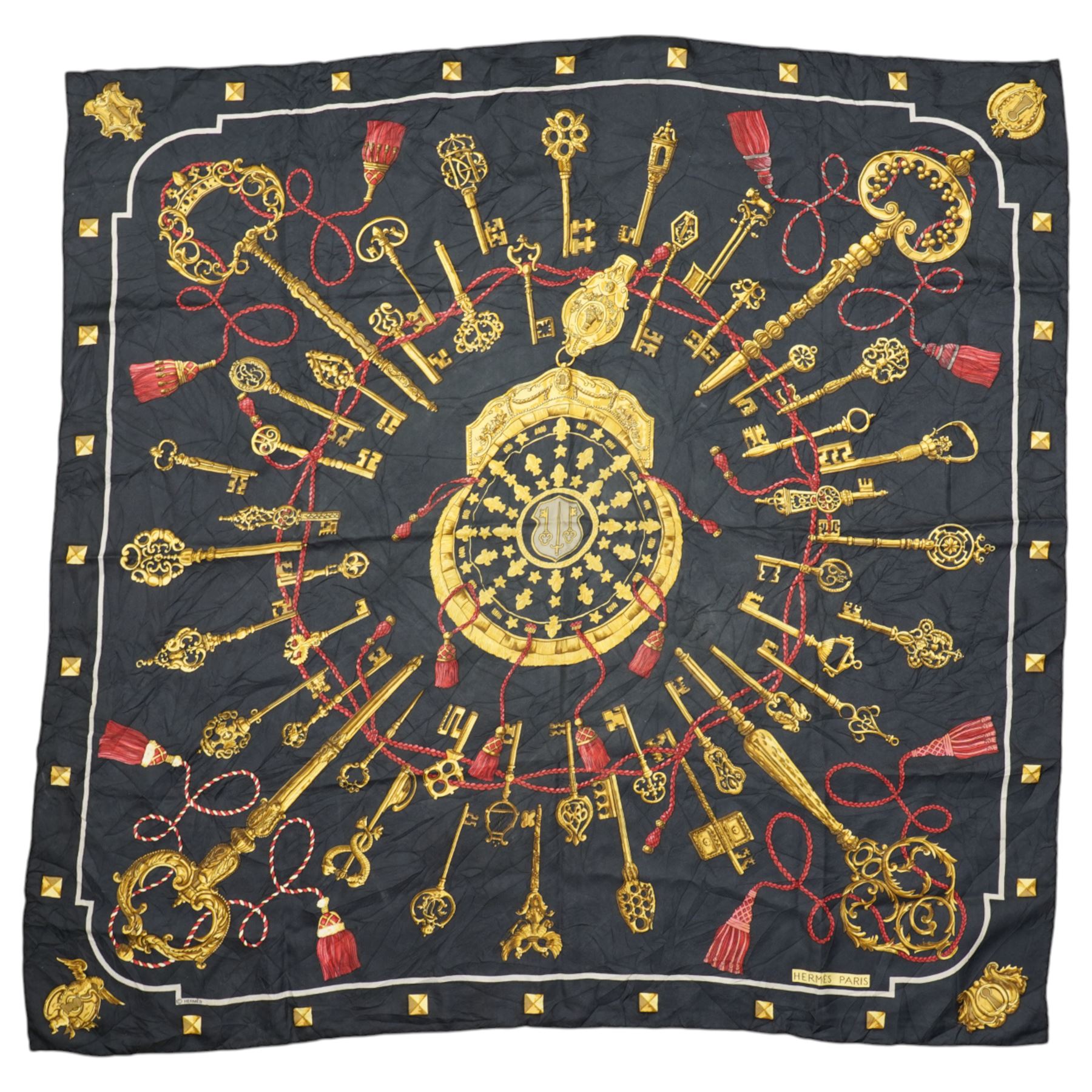 Hermes 'Les Clefs' silk scarf, in the black red and gold colourway, designed by Cathy Latham, 86cm x 86cm