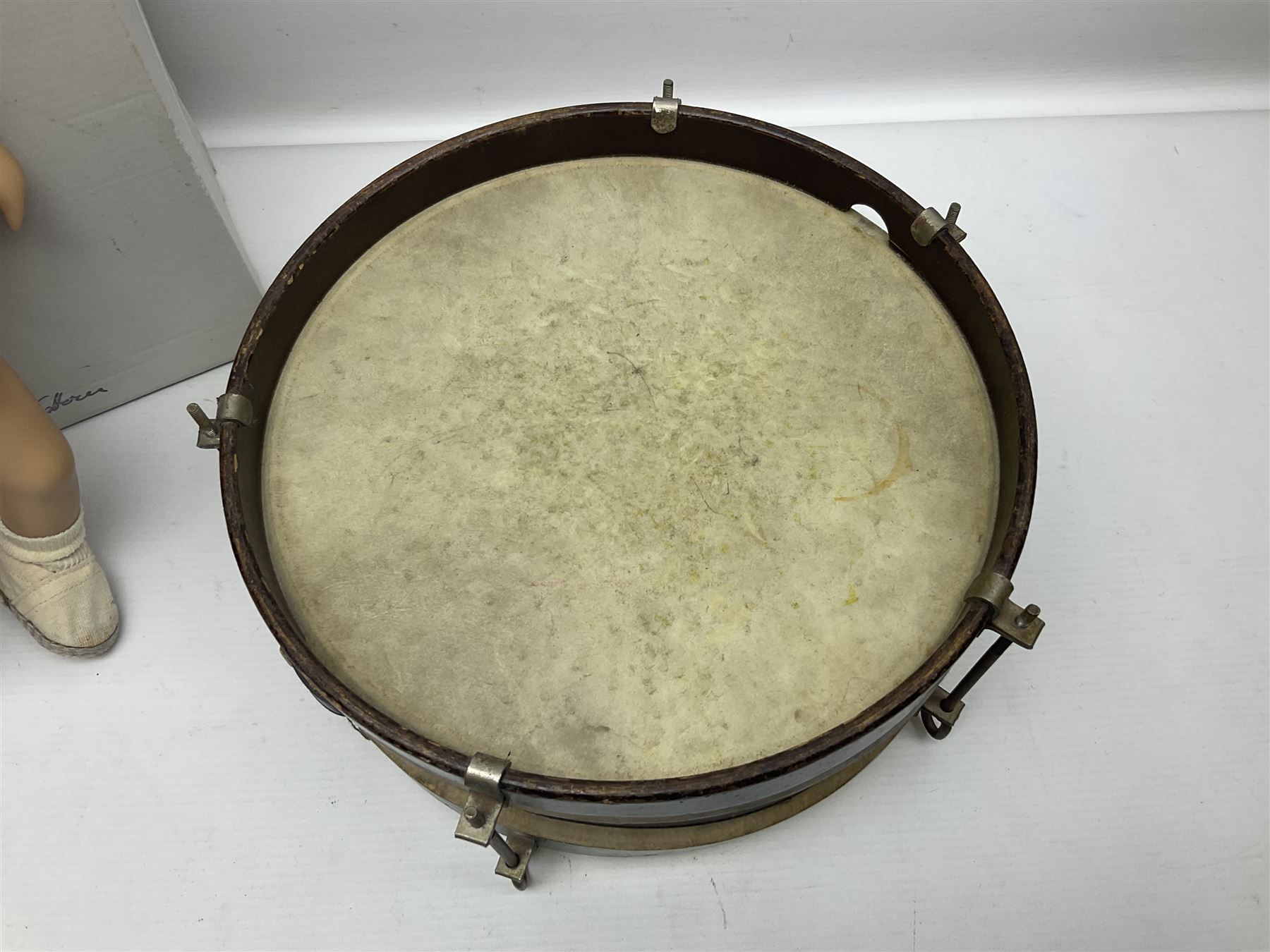 German Gotz articulated vinyl baby doll 'Claire' c1997 with original clothing, hat and labels; artist designed by Sylvia Natterer H35cm; boxed; and small child's wooden cased drum (2)