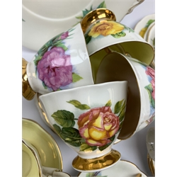 Royal Standard Harry Wheatcroft 'World Famous Roses' tea and coffee wares, comprising teapot, six teacups and six saucers, six coffee cups and five saucers, six side plates, milk jug, cream jug, two open sucriers, and sandwich plate. 