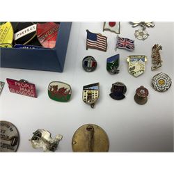 Collection of vintage  enamel badges, including Butlins, Olympic, Silver Jubilee, Dinky and Corgi examples