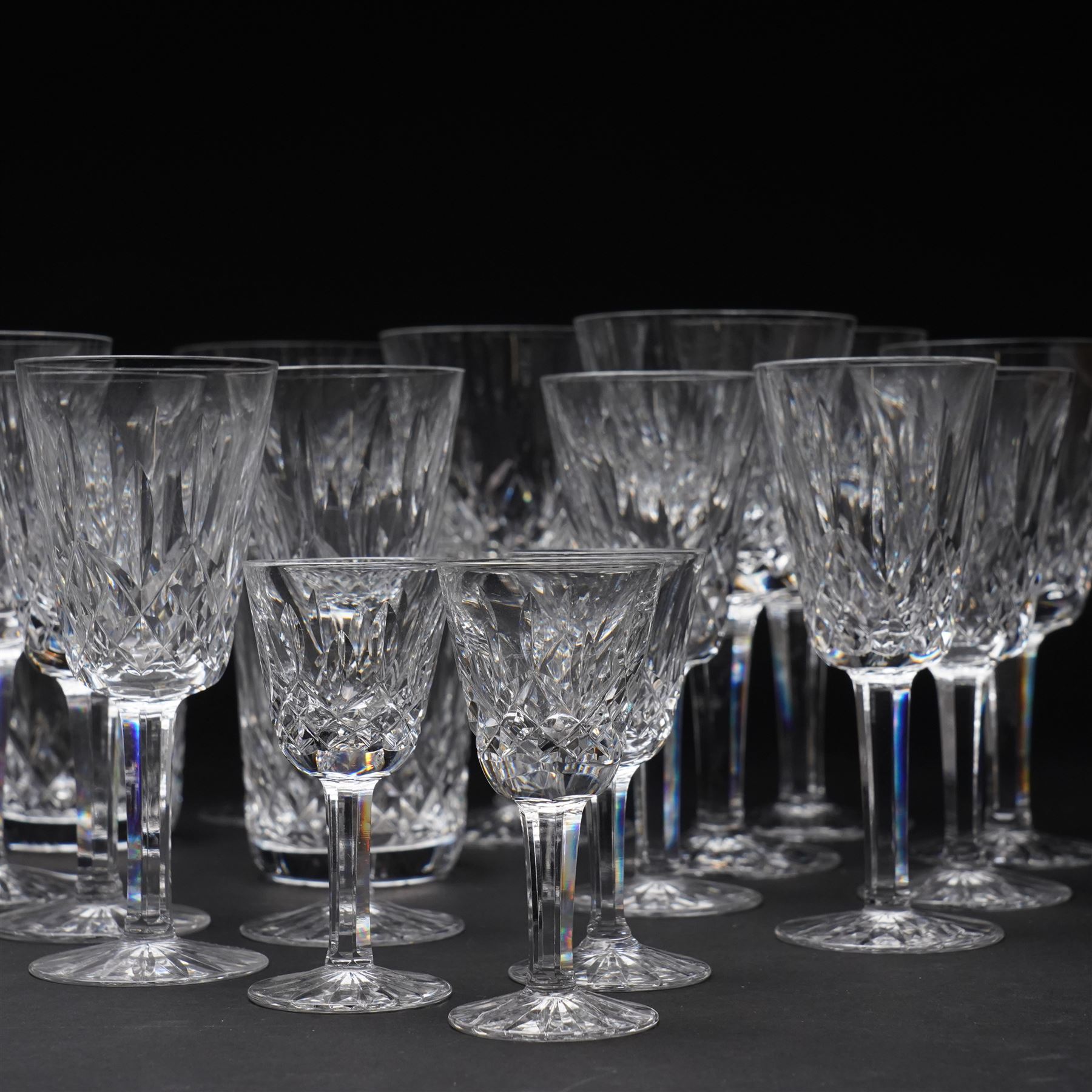 Waterford 'Lismore' pattern part suite, comprising three small tumblers, six liqueur glasses, twelve sherry glasses, eight large wine glasses and three smaller examples