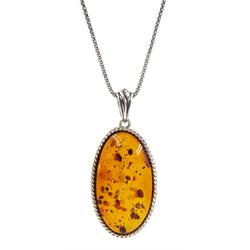 Silver oval Baltic amber pendant necklace