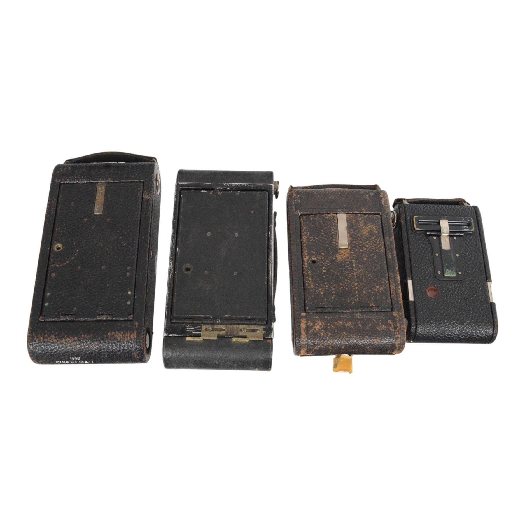Four Eastman Kodak Co. folding cameras, comprising No. 3-A Folding Autographic Brownie, No. 3-A Folding Pocket Kodak model B-4, No. 1 Kodak Junior and No. 3  Folding Pocket Kodak model C