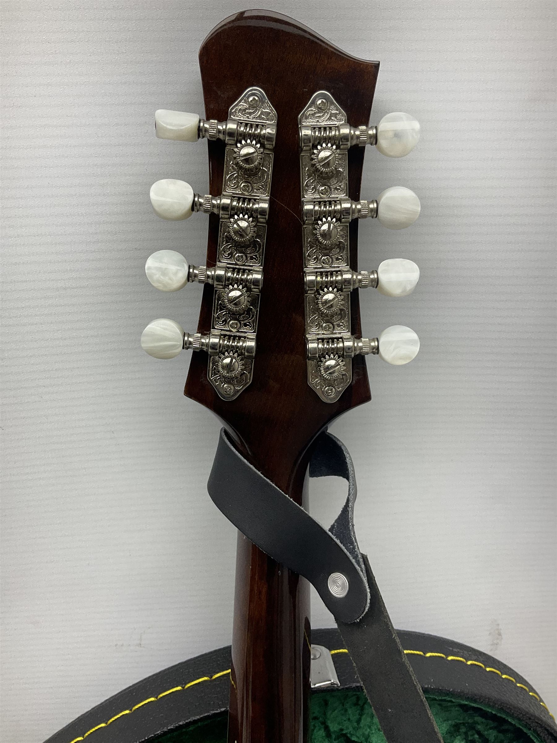 Eastman eight-string mandolin model MD504, serial no.140435406, L66cm; in TGI hard carrying case; together with case of instructional CDs