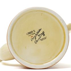 Clarice Cliff Autumn Crocus pattern part coffee service for six, comprising coffee pot and cover, six coffee cups and four saucers, and a milk jug, with Bizarre and printed marks to base, coffee pot H19cm