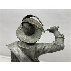 Spelter figure modeled as Cavalier with a raised sword, upon a circular base, H52cm