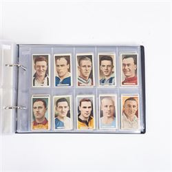 Collection of Edwardian and later Football related trading and cigarette cards, including forty-nine of fifty 1906 Ogden's Football Club Colours, 1922 PALS Footall series, ninety of one hundred 1925 Gallaher Famous Footballers, complete set of forty-four 1926 Ogden's Captains of Association Football Clubs and Colours, complete set of fifty 1927 Players Football Caricatures by MAC,  complete set of fifty 1927 Players Football Caricatures by RIP,  complete set of fifty 1930 Players Association Cup Winners, complete set of 50 1933 Ogdens AFC Nicknames etc, housed in brown cigarette card album