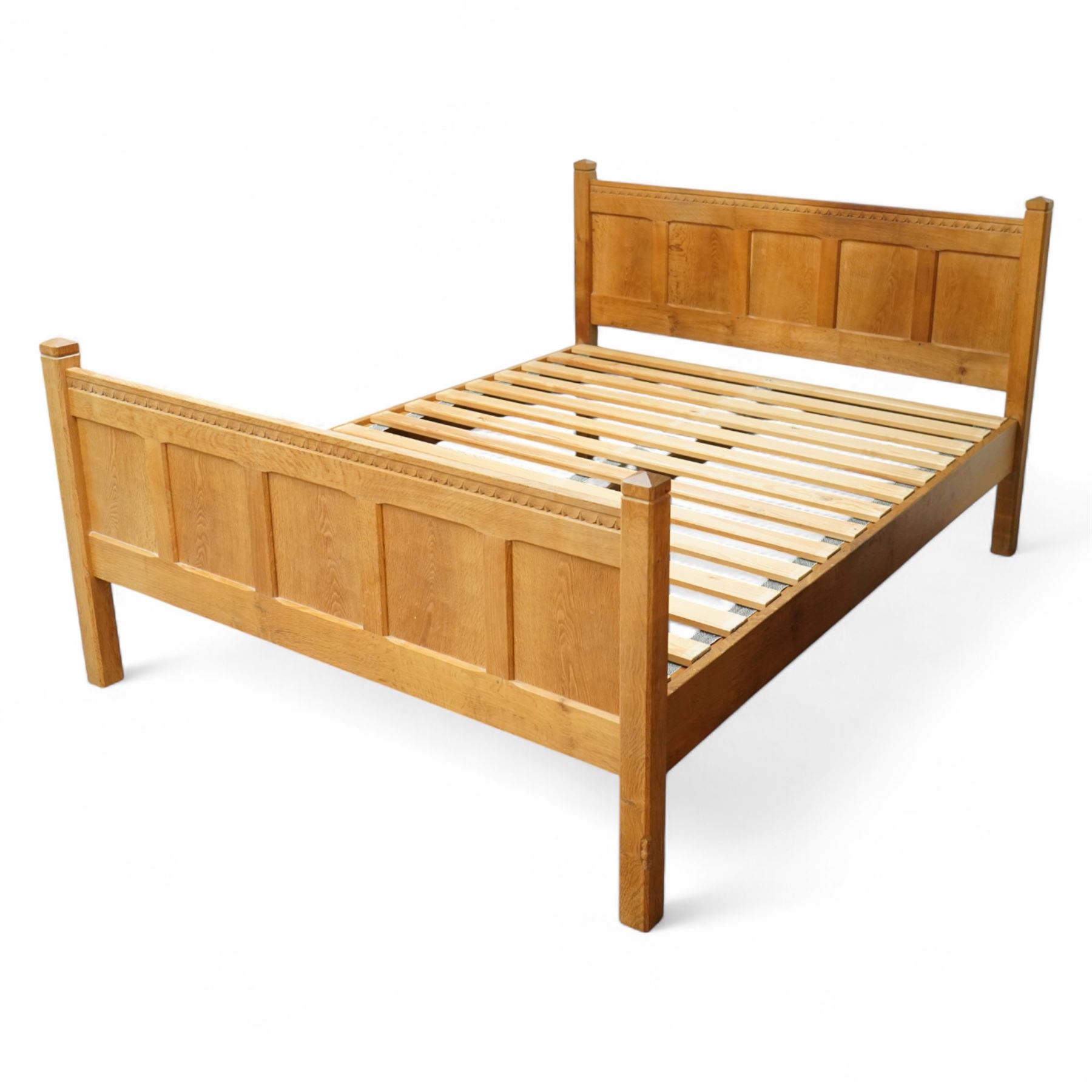 Beaverman - Yorkshire oak 5' double bedstead, panelled headboard and footboard with carved chip and adzed decoration, square corner posts and slatted base by Colin Almack of Sutton near Thirsk