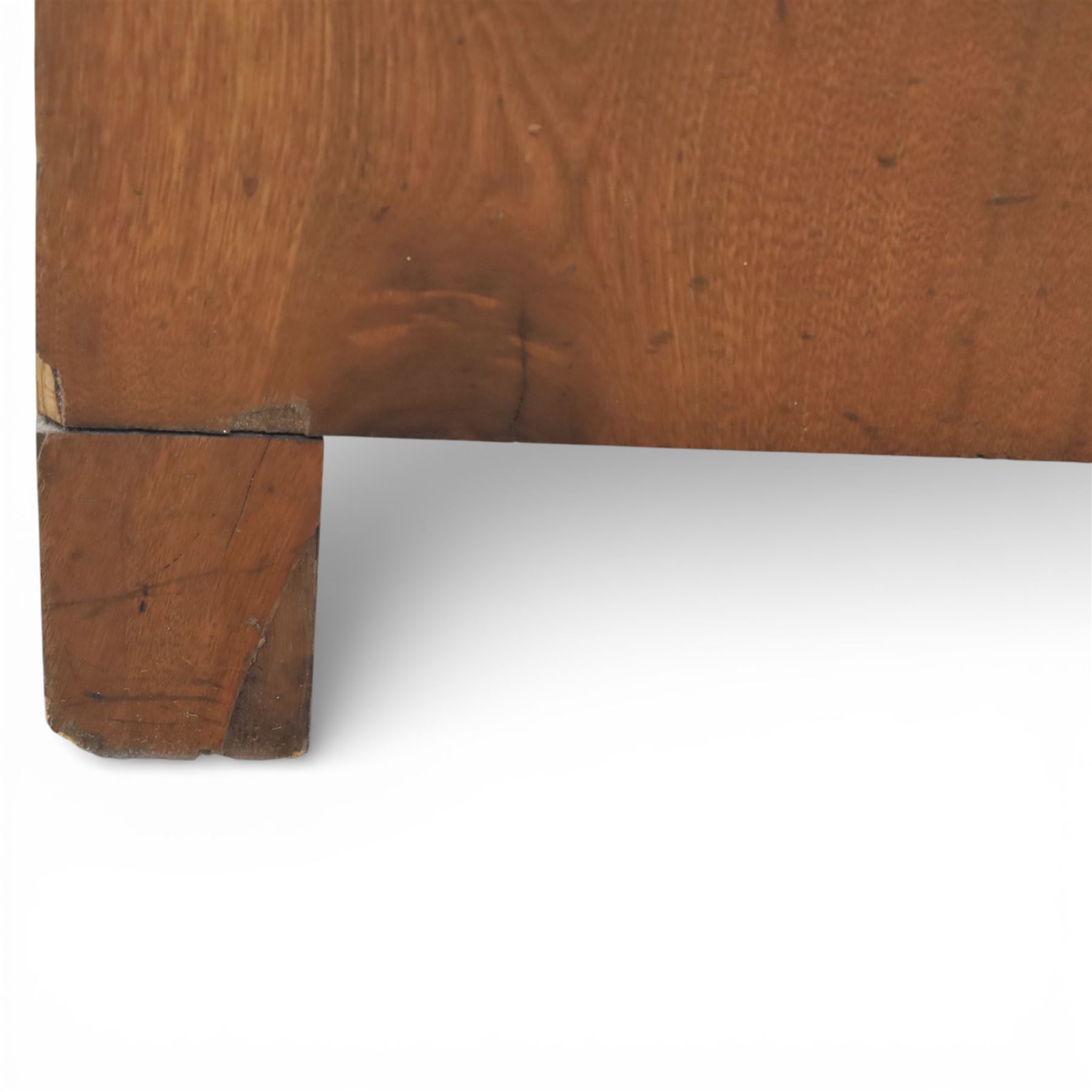 Late Victorian walnut and burr walnut chest of drawers, moulded top with rounded corners, finely figured burr walnut drawer fronts arranged as three long drawers, brass batwing handle plates, the lower section raised on turned bun feet