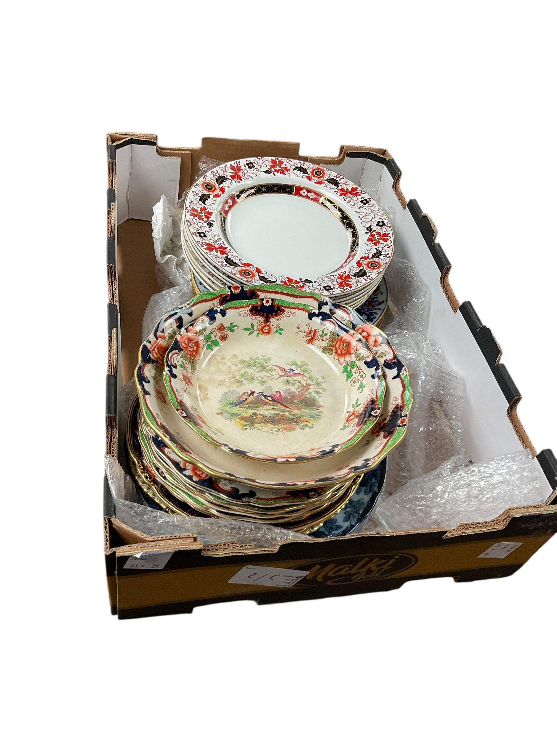 Two Coalport trios, decorated with birds and flowers, together with coloured glass decanters and other collectables, in five boxes 