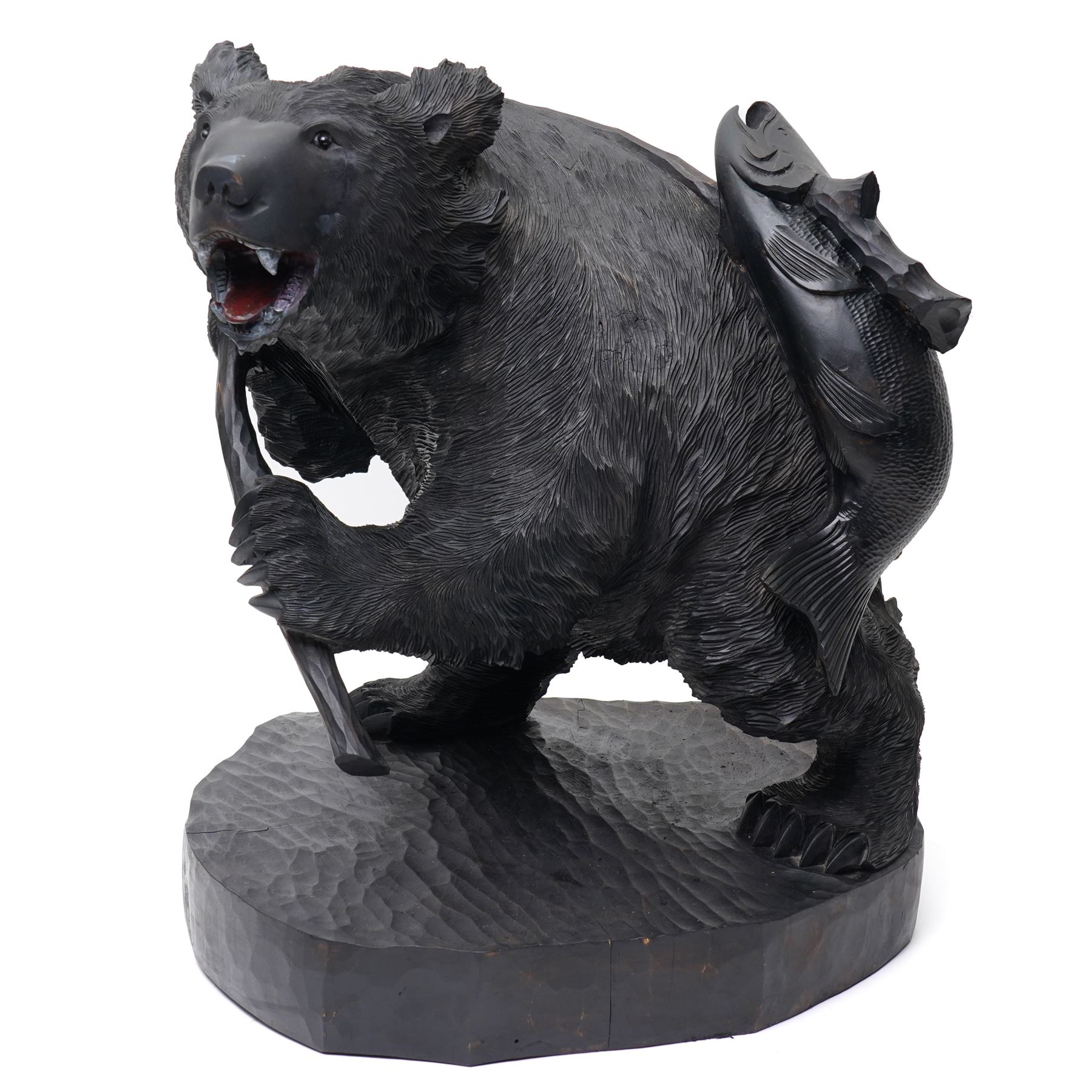 Large Black Forest style carved bear with a fish H50cm