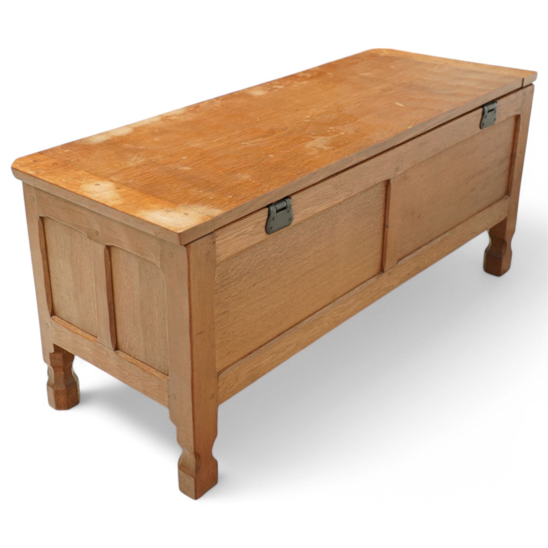 Squirrelman - oak six panel blanket box, on octagonal feet, squirrelman carving on the feet by Wilfred Hutchinson, Husthwaite, Thirsk
