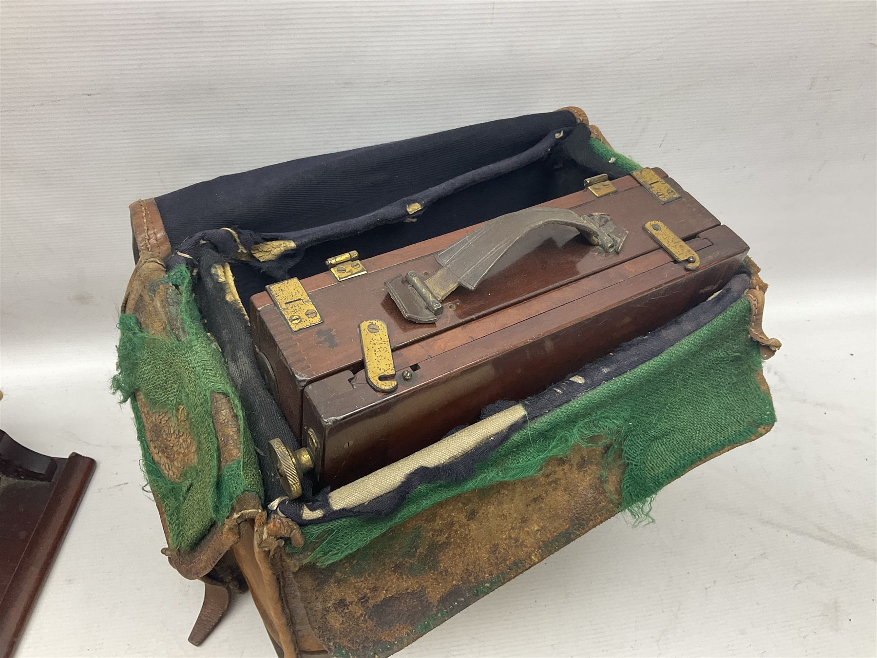 Collation of folding plate cameras of various sizes folding plate in mahogany and lacquered brass, together with camera plates and slides
By vendors repute some slide are from the Gandolfi workshop