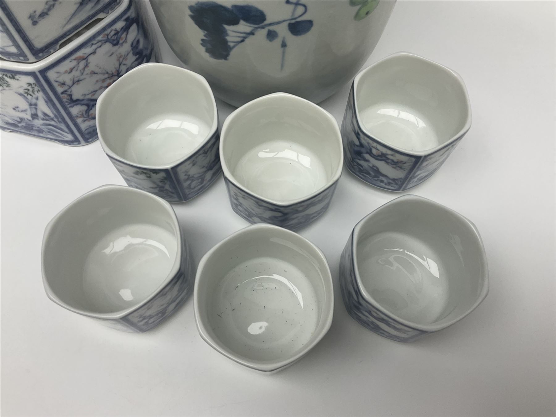 Chinese vase, decorated with vines and grapes and signed beneath, together with Chinese tea set of hexagonal form, comprising teapot and stand and six cups, vase H30cm