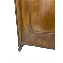 Early 20th century Italian walnut armoire wardrobe, the pierced and scrolling pediment carved with acanthus leaf detail, flanked by two scrolling cartouche with matching corbels below, the two panelled doors with applied carved rinceaux slips, with a central spiral turned upright, enclosing single shelf and hooks, raised on scroll feet