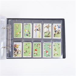 Collection of Edwardian and later Football related trading and cigarette cards, including forty-nine of fifty 1906 Ogden's Football Club Colours, 1922 PALS Footall series, ninety of one hundred 1925 Gallaher Famous Footballers, complete set of forty-four 1926 Ogden's Captains of Association Football Clubs and Colours, complete set of fifty 1927 Players Football Caricatures by MAC,  complete set of fifty 1927 Players Football Caricatures by RIP,  complete set of fifty 1930 Players Association Cup Winners, complete set of 50 1933 Ogdens AFC Nicknames etc, housed in brown cigarette card album