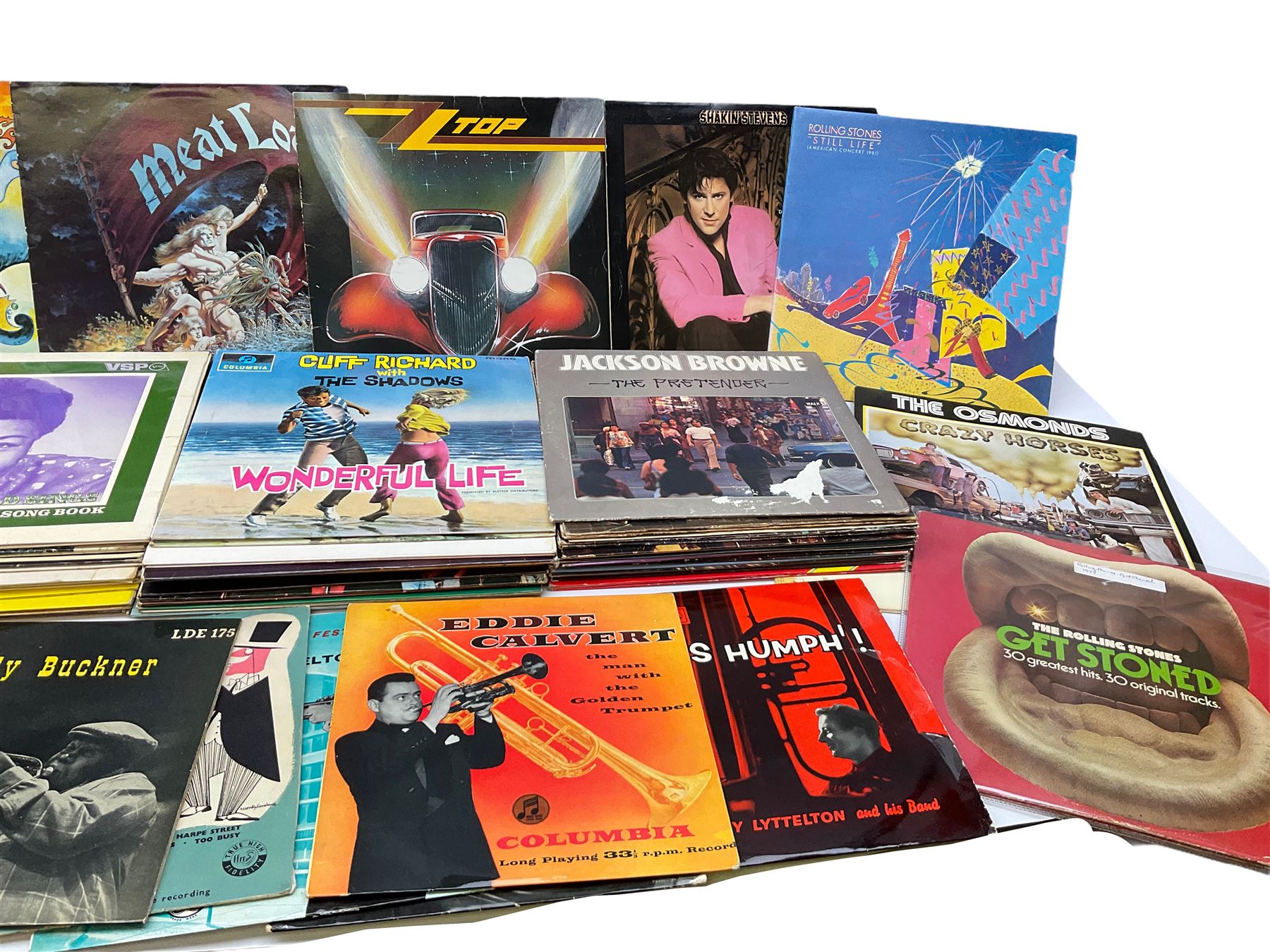 Over seventy LP records 1960s/70s/80s including seven Beatles, five Rolling Stones, Cliff Richard and The Shadows, Isaac Hayes, Jackson Browne, The Osmonds, Beach Boys, Duane Eddy, Buddy Holly, Elvis Presley, Carpenters, Thin Lizzy, Meat Loaf, Black Sabbath, Dubliners etc; and twelve 10