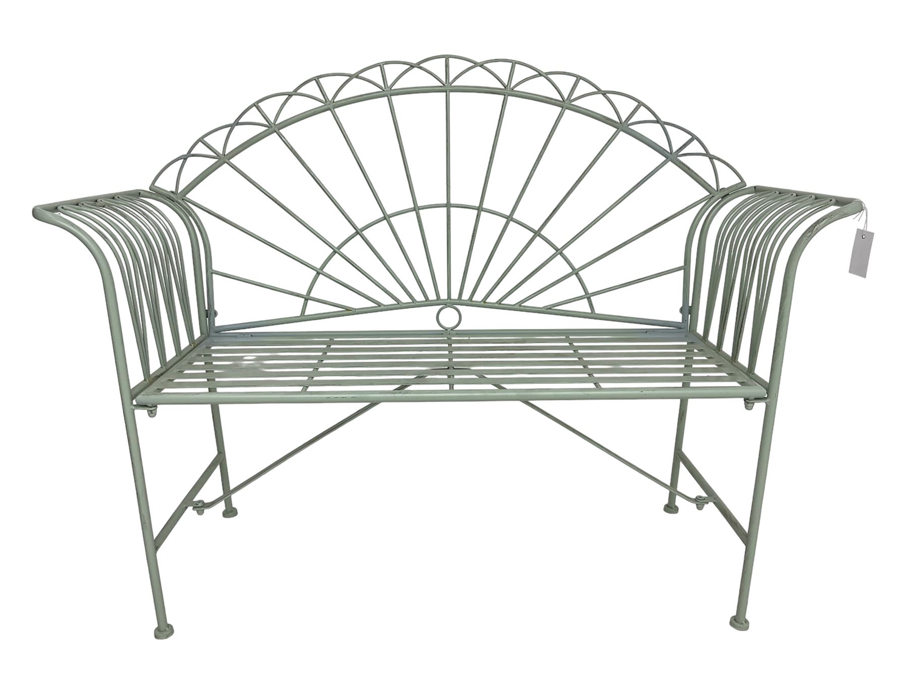Regency design wrought metal bench, the fan back over out-swept arms, strap seat on supports united by stretchers, in pale teal finish