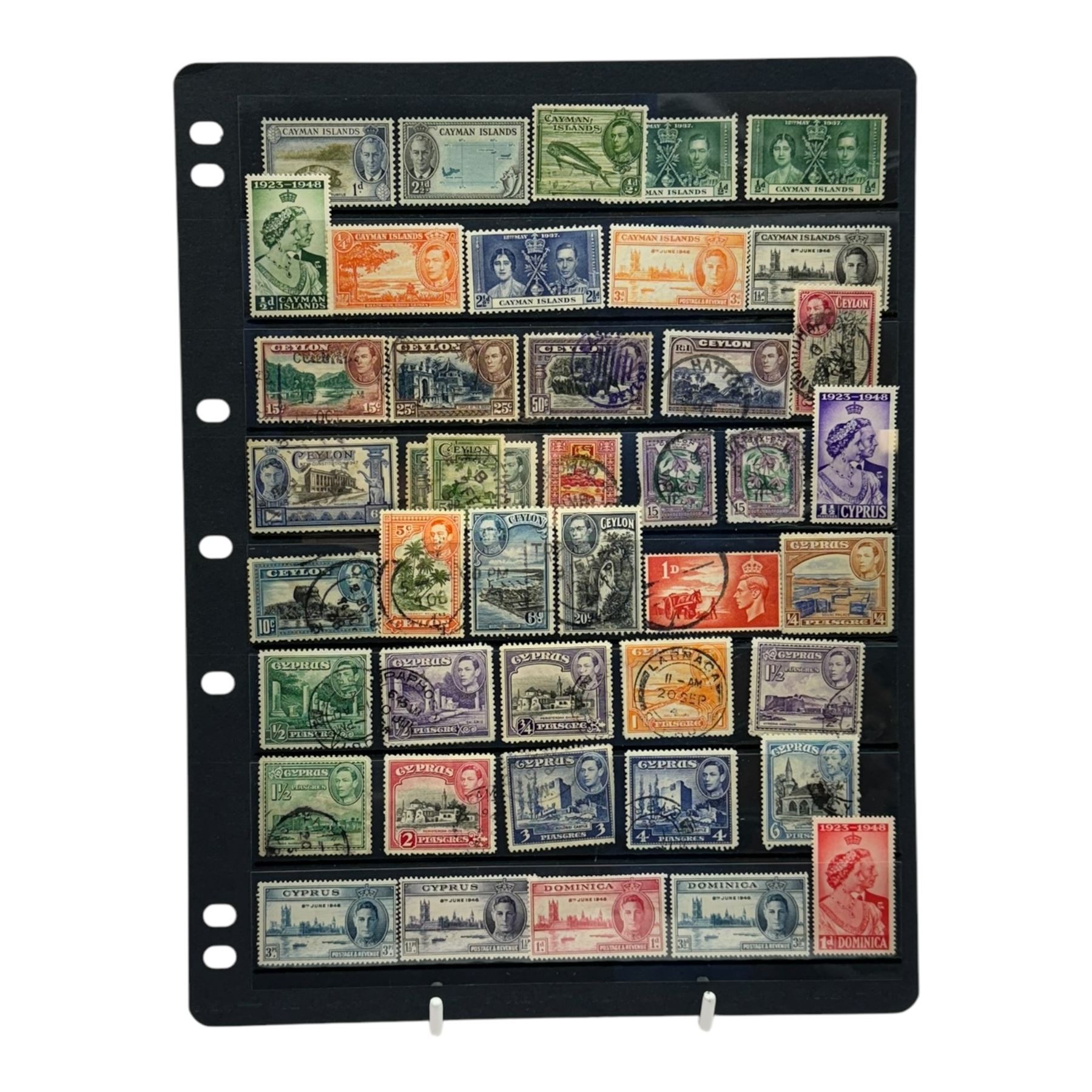 Mostly Commonwealth stamps with many from the reign of King George VI, including Aden, Ascension, Antigua, Australia, Bahamas, Bermuda, Barbados, Basutoland, British Guiana, British Honduras, British Solomon Islands, Burma, Newfoundland, Canada, Cayman Islands, Ceylon, Cyprus, Dominica, Fiji, Gambia, Gibraltar, Gold Coast, Grenada, Hong Kong, India, Jamaica, Malaya, Malta, New Zealand etc, housed on stock sheets