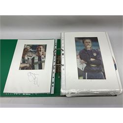 Collection of approximately 200 Leeds United related autographs, predominantly signed newspaper cuttings, contained within ring binder, together with a number of loose examples