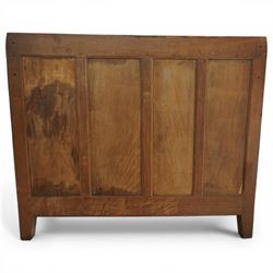Rabbitman - oak single pedestal desk, adzed top with galleried back, with three graduating drawers with turned wooden knobs, enclosed kneehole with adzed detailing throughout the panelling and supports, with carved rabbit signature, by Peter Heap of Wetwang