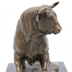 Bronze figure, modelled as a prancing bull, upon a rectangular marble base, bearing foundry stamp, overall H14cm L21cm
