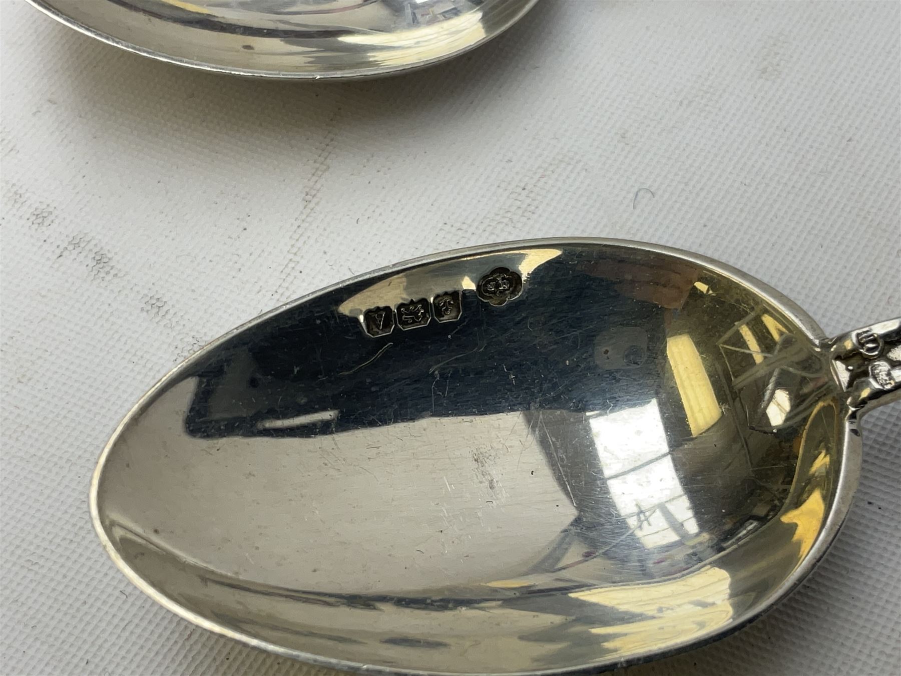 Three hallmarked silver shooting spoons including Royal Military College Rifle Club, Eastern Command S. of M. Hythe etc (3)