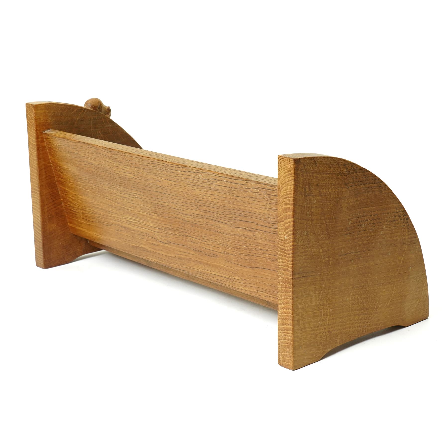 Mouseman - adzed oak book trough, curved end supports, with carved mouse signature, by the workshop of Robert Thompson of Kilburn