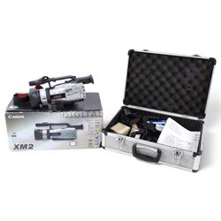 Canon XM2 3CCD Digital Video Camcorder, with original box and instructions, contained in a...