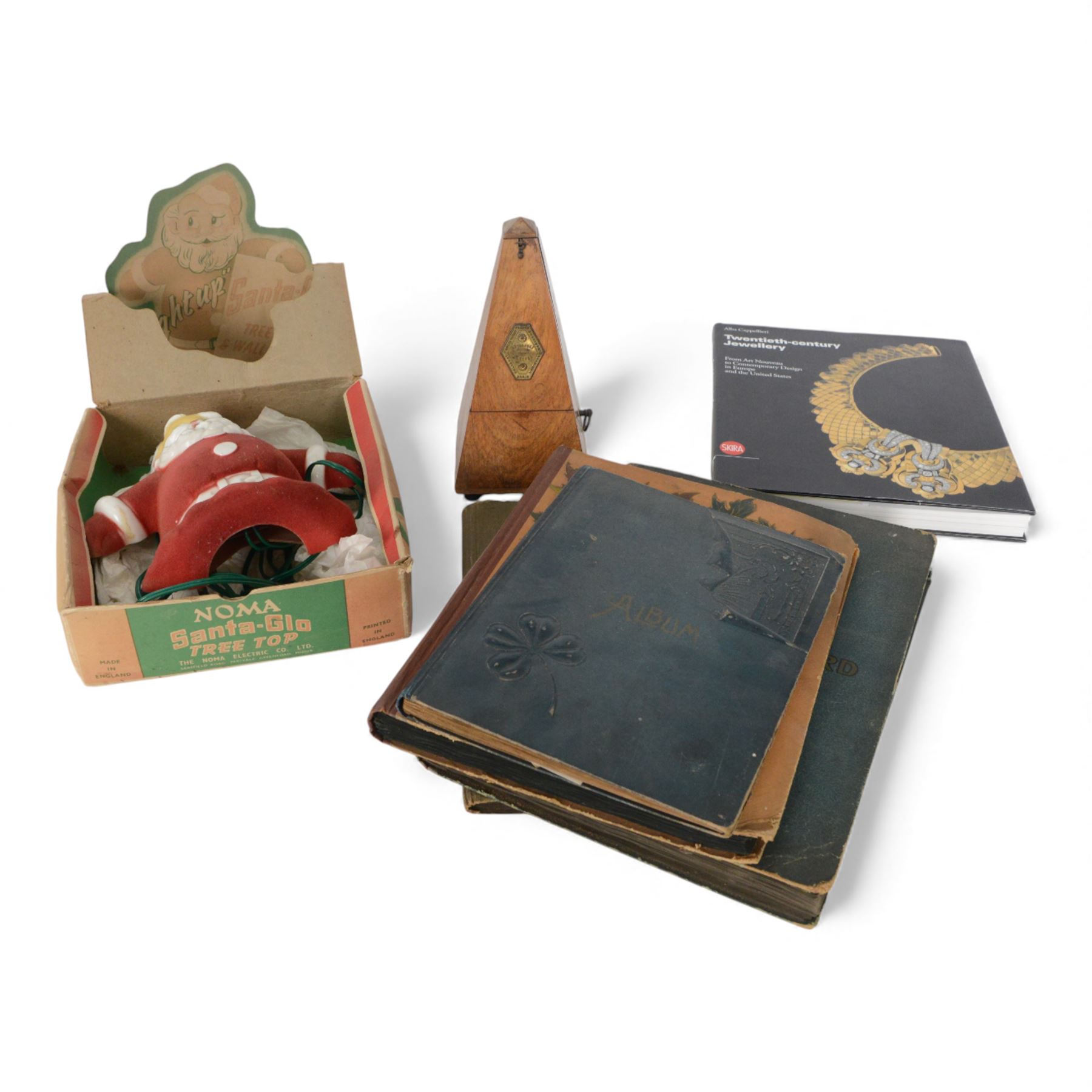 French cased metronome together with Noma Santa-Glo and a collection of museum postcards of nude sculpture 