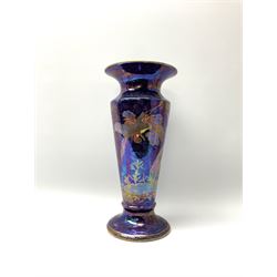 A Maling vase decorated with cranes upon an iridescent purple ground, no 3196. with blue printed and red painted marks beneath, H32.5cm.