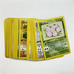 Collection of vintage English and French language Pokemon TCG trading cards, approximately eighty English cards housed in Pokemon file, including Base Set, Base Set 2, Team Rocket, Neo Discovery, Jungle and Fossil examples, with thirteen holos including Charizard 4/102, Dark Blastoise 3/82, Ninetales 12/102, Mewtwo 10/102, and First Edition Machamp 81/102, approximately two hundred French language cards, many first editions, including four first edition holos, Roucarnage 8/64, Nidoqueen 7/64, Melodelfe 1/64 and Mackogneur 8/102, all loose, together with a Funfax Pokemon Collectors File