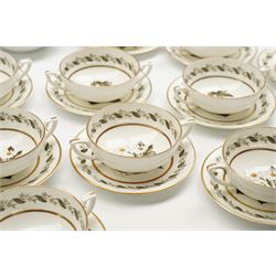 Extensive Royal Worcester Bernina pattern table service comprising thirteen dinner plates, twelve dessert plates, nine two handled soup bowls and stands, twelve side plates, three vegetable dishes and covers, pair of sauce boats and stands, two graduated oval meat plates, eleven tea cups, fourteen saucers, sixteen tea plates, coffee pot and eight coffee cups and saucers, (113 pieces) 