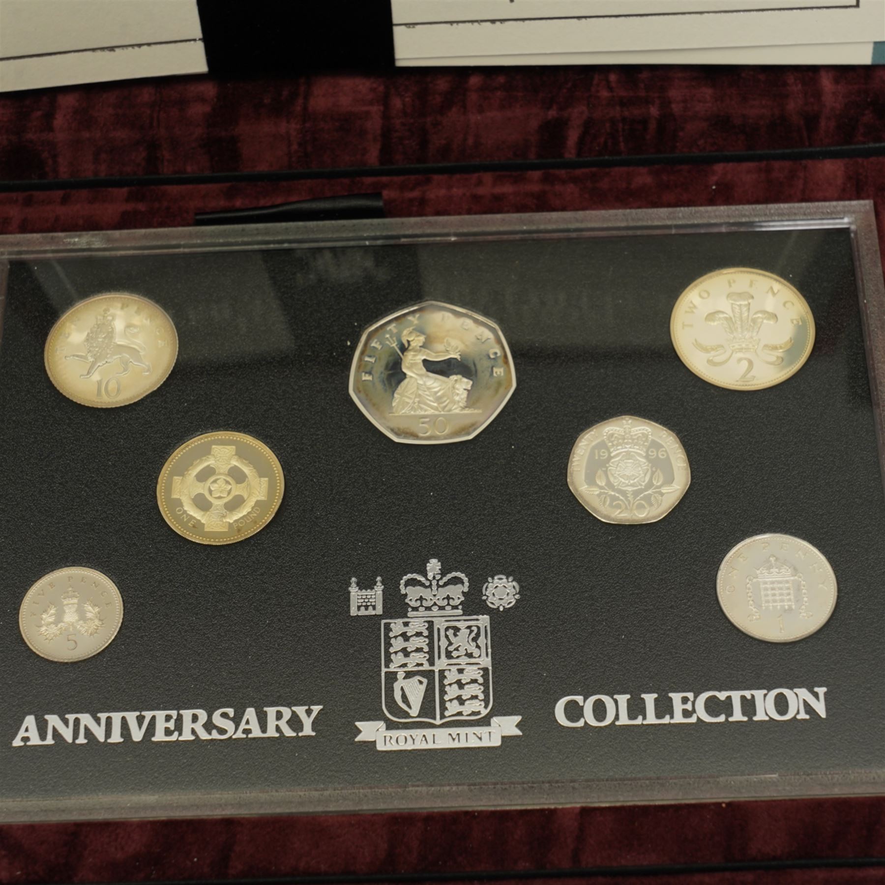 The Royal Mint United Kingdom 1996 silver proof 'Anniversary Collection' and 2008 silver proof 'Emblems of Britain' and 'Royal Shield of Arms' coin collections, cased with certificates