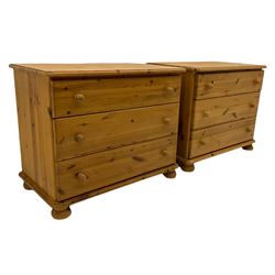 Two pine three drawer chests