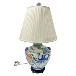 Table lamp of baluster form, decorated with birds and peonies, on a wooden pedestal, including shade H161cm