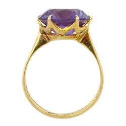 Gold round synthetic purple stone ring, stamped 18K
