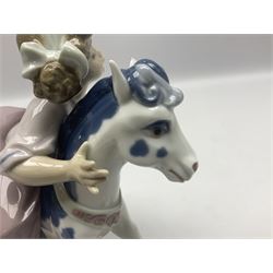 Three Lladro figures, Faithful Steed no 5769, Best Foot Forward no 5738 and Lambkins no 5469, all with original boxes, largest example H21cm 