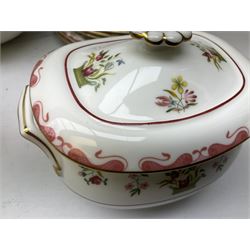 Wedgwood dinner service decorated in the 'Bianca' pattern, to include eight dinner plates, eight bowls, eight side plates, eight twin handled souo bowls, eight soup bowl saucers, eight teacups, eight teacup saucers, six dessert plates and two larger, two twin handled lidded tureens, milk jug, two sauce boats, salt and pepper shakers, oval serving  plate, twin handled sandwich plate, covered sucrier, small rectangular dish and two small circular dishes, all with printed stamp mark beneath