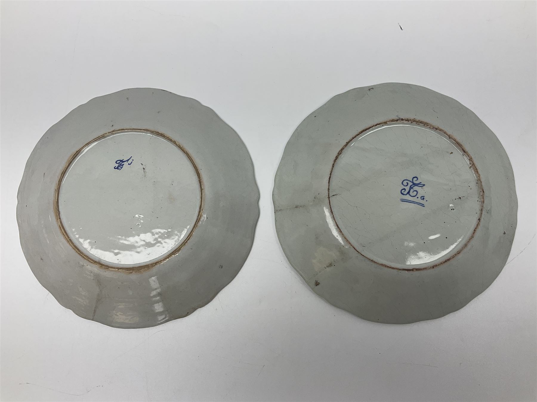 Four French Faience plates, comprising Je suis las de le porter, Le malheur nous reunit, Je desire y arriver and Eveque de Meaux, D24cm  