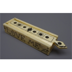  Small rectangular Scrimshaw box containing twenty three miniature Whale Bone dominoes, sliding top decorated with roundels, the sides inscribed, 'Love Me' L9cm, W2.25cm, H1.75cm  