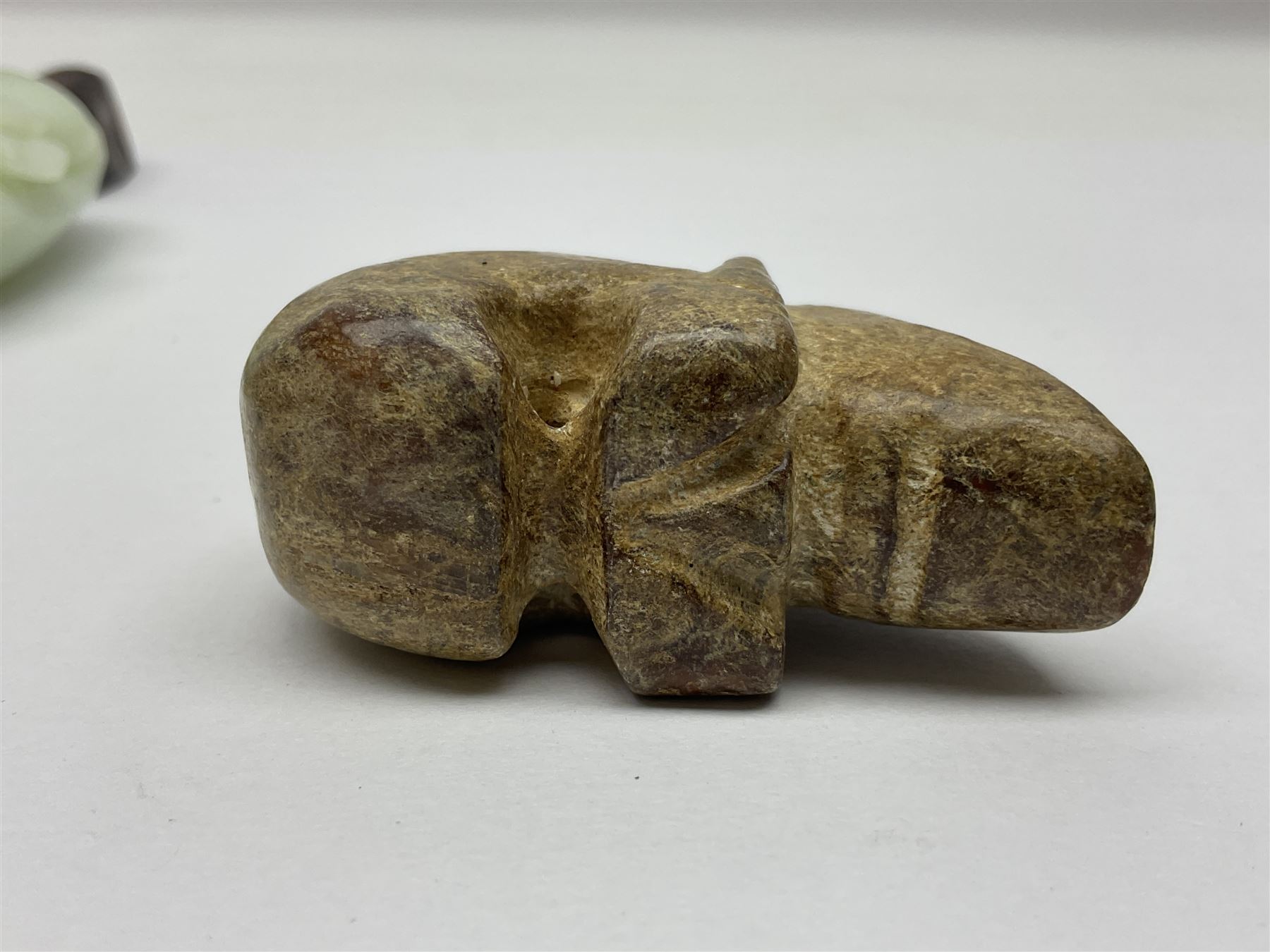 Chinese hardstone carving of a fish amongst coral, with platted rope handle, together with other hardstone and soft stone carvings  