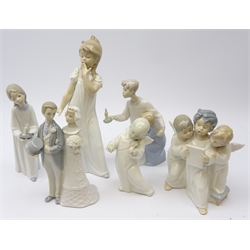  Five Lladro figures comprising Angel Playing the Violin, Bride & Groom, Three Angels Singing and two others and a Nao figure, all boxed  