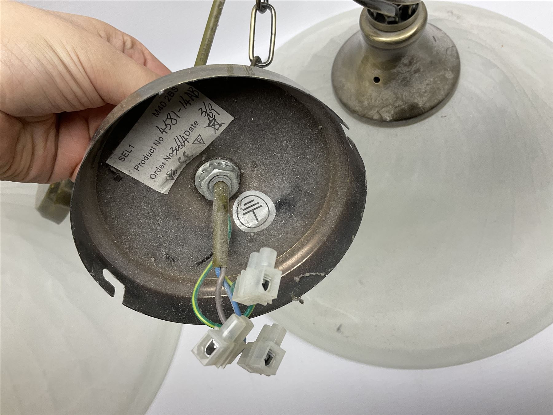 Three frosted glass light fittings with brushed metal mounts, approx L30cm excl fitting