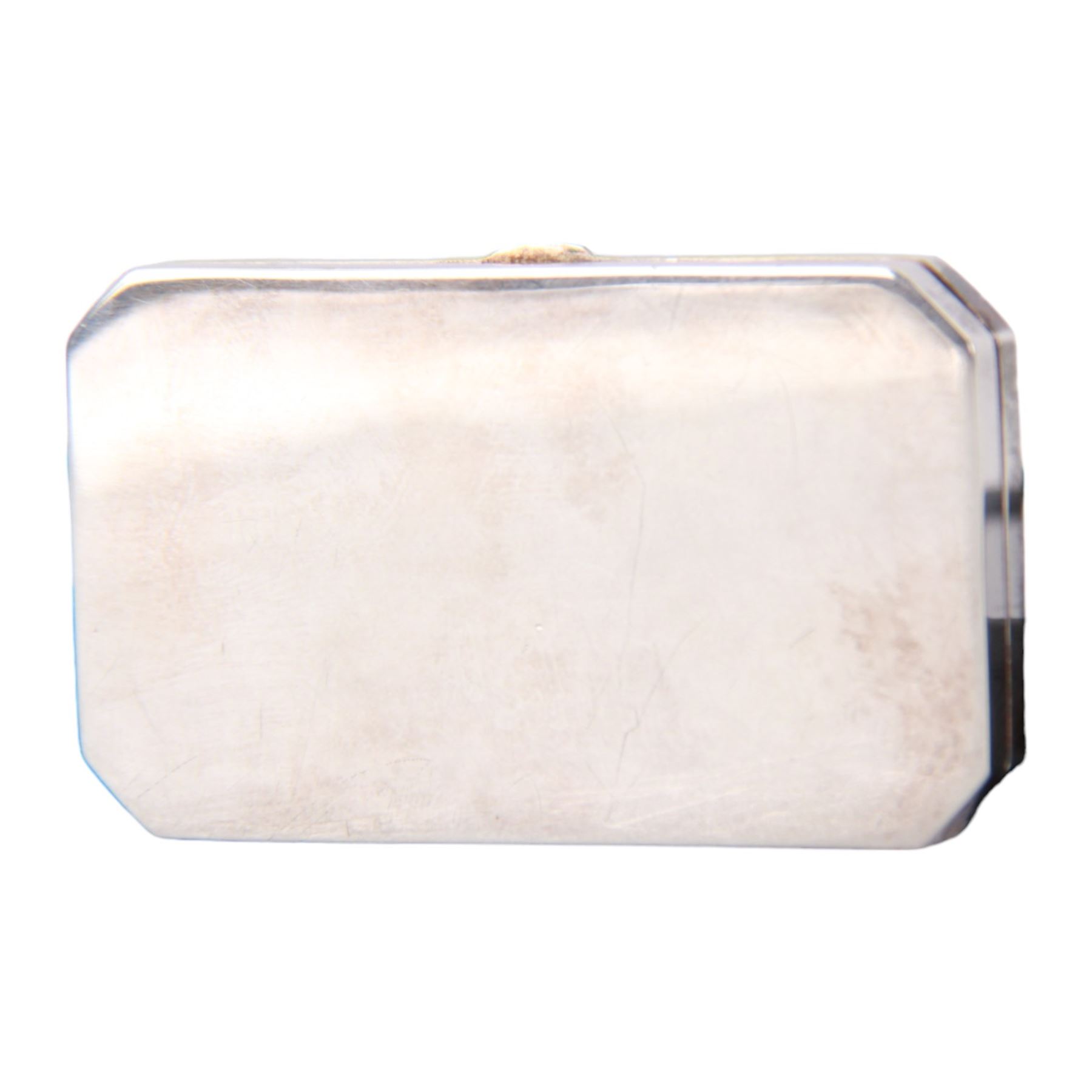 Modern silver miniature paint box, of plain rectangular form with canted corners, the hinged cover lifting to reveal a compartmented gilt interior containing twelve paints, hallmarked Sarah Jones, London 1986, L6cm