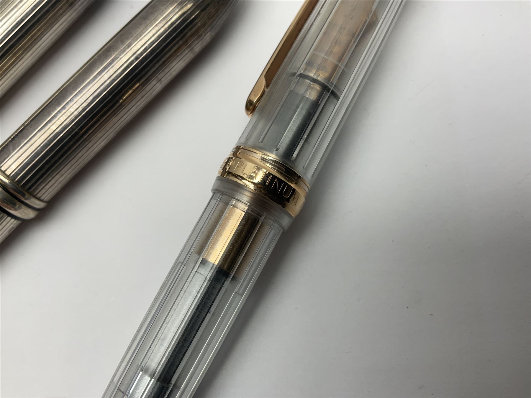 Cross sterling silver fountain pen, having fluted barrel and cap, stamped 