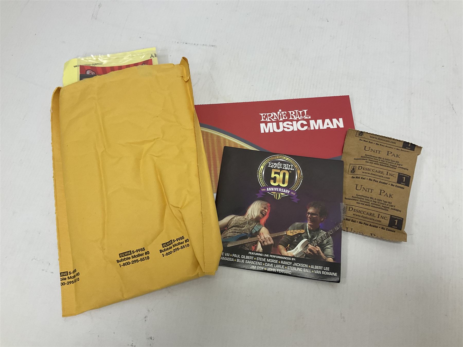 Music Man Bongo 4 string bass guitar, in sapphire black finish, serial no F42547, in black Music Man hard case, guitar L113cm